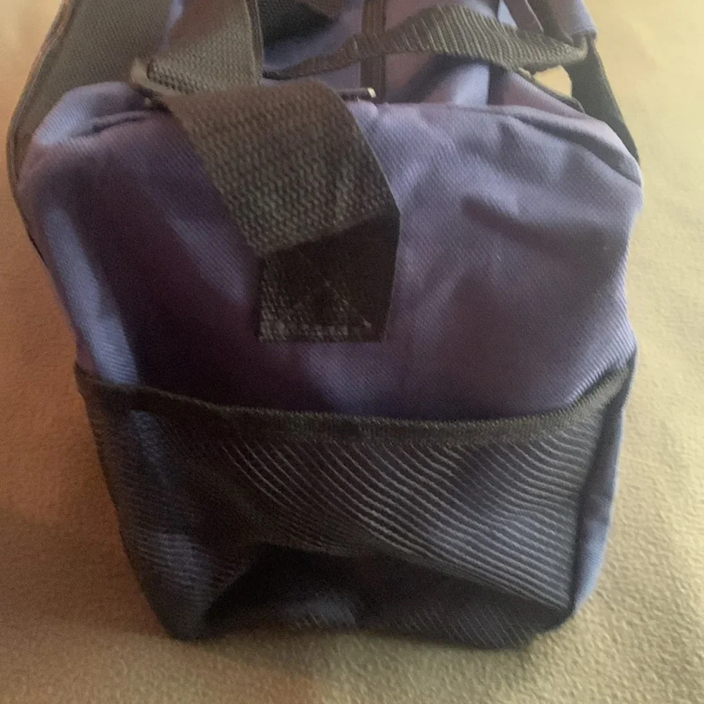 Smithsonian Air & Space blue and black duffel bag. Approx 17” x 9” x 7 1/4”
